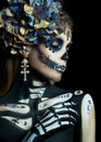 Halloween beauty skeleton woman makeup face. Girl death Halloween costume. Day of The Dead. Charming and dangerous Calavera Royalty Free Stock Photo