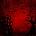 Halloween bloody red background with bats, terrible dead tree, spiders, webs and castle