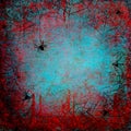 Halloween bloody red and teal grunge background with webs and spiders