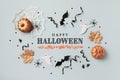 Halloween blue background with party decorations from pumpkins, bats, spider web and ghosts. Holiday card for Happy halloween Royalty Free Stock Photo