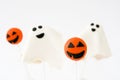 Halloween cake pops with phantom and pumpkin shape isolated on white background Royalty Free Stock Photo