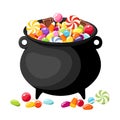 Halloween candies in witches cauldron. Royalty Free Stock Photo