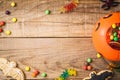 Halloween candies on wood table - holiday background