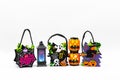 Halloween Candy Bags Cute Felt Pouches with Handles, Trick or Treat Goody Bags on white background Royalty Free Stock Photo