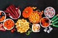 Halloween candy buffet table scene over a black stone background Royalty Free Stock Photo