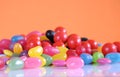 Halloween candy close up on white reflective background