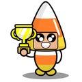 Halloween candy mascot costume holding a trophy