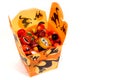 Halloween candy in orange chinese container Royalty Free Stock Photo