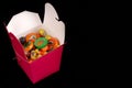 Halloween candy in a red chinese food container Royalty Free Stock Photo
