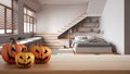 Halloween carved pumpkins on wooden table. Autumn decoration over interior design scene. Modern minimalist japandi bedroom with Royalty Free Stock Photo