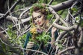 Halloween character or Forest soul woman outdoor portrait