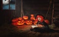 Halloween. child little witch with pumpkin Jack and magical bo Royalty Free Stock Photo