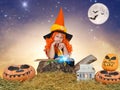 Halloween.Children in costumes for Halloween walk in the woods at night and conjure. Royalty Free Stock Photo