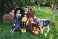 Halloween children enjoying in the autumn park on field. Halloween on countryside. Children sister and brother with