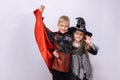 Halloween children on white background. Kids in vampire and witch costume. Happy Halloween. Banner with copy space Royalty Free Stock Photo