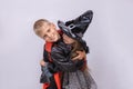 Halloween children on white background. Kids in vampire and witch costume. Happy Halloween. Banner with copy space Royalty Free Stock Photo
