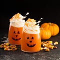 Halloween cold cocktail or drink with jack o`lantern face