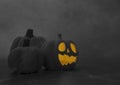 Halloween Composition with Black Scary Pumpkin Lanterns and Cobweb on a Grunge Layout. Royalty Free Stock Photo