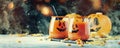 Halloween composition with festive red bloody drink and smiling pumpkins, with sweet corn and fallen leaves on dark background,