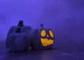 Halloween Composition with Scary Pumpkin Lanterns and Cobweb in a Dark Violet Light.
