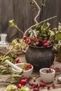 Halloween concept background. Witch bowler, mistletoe, elderberry. Dry herbs, flowers, fresh berries Royalty Free Stock Photo