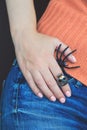 Halloween female hand with spider and skull ring