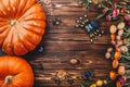 Halloween concept with fresh pumpkins, spiders and bugs with flowers. Trick or Treat view from above