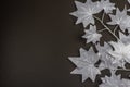 Halloween concept. Ghostly white maple leaves on a branch, pumpkins