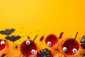 Halloween concept. Top view photo of glasses with drink floating eyeballs punch bat silhouettes pumpkins insects centipedes Royalty Free Stock Photo