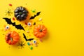 Halloween concept. Top view photo of pumpkins bat silhouettes spooky eyes centipede candies spiders and confetti on isolated