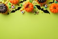 Halloween concept. Top view photo of pumpkins bat silhouettes spooky eyes spiders centipede and candies on isolated light green