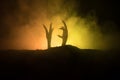 Halloween concept, zombie hand rising out from the ground or zombie hand coming out of his grave Royalty Free Stock Photo