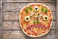 Halloween creative scary food eye monster zombie face pizza snack with mozzarella