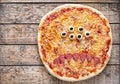 Halloween creative scary food monster zombie face pizza snack with mozzarella