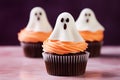 Halloween cupcakes with ghost topping decoration Royalty Free Stock Photo