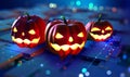 Halloween, cyber party, neon light. Three pumpkins on stones