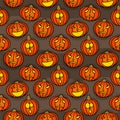 Halloween dark seamless pattern with carved pumpkins Royalty Free Stock Photo