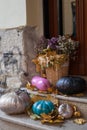 Halloween decorated front door with various color and shape pumpkins Royalty Free Stock Photo