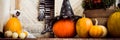 Halloween decorated front door with various size and shape pumpkins and skeletons. Halloween house exterior spooky decorations. Royalty Free Stock Photo