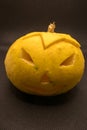 halloween decorated pumpkin isolated on black Royalty Free Stock Photo