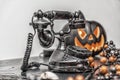 Halloween decoration vintage black rotary phone, black pumpkin Royalty Free Stock Photo