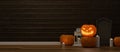 Halloween decorations with pumpkin lamps, candle and scary stuff on the floor in living room, 3D rendering