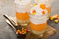 Halloween dessert in a jar layered candy corn parfait Royalty Free Stock Photo