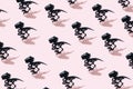 Halloween Dinosaur Skeletons on a Light Pink Background