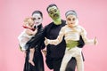 Halloween Family. Happy Father, Mother and Children Girls in Halloween Costume and Makeup