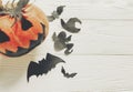 Halloween flat lay. jack lantern pumpkin with witch ghost bats a Royalty Free Stock Photo