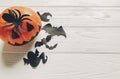 Halloween flat lay. jack lantern pumpkin with witch ghost bats a Royalty Free Stock Photo