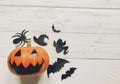 Halloween flat lay. jack lantern pumpkin with witch ghost bats a Royalty Free Stock Photo