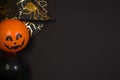 Halloween flat lay. Top view of witch hats, themed balls on a black background. An eerie holiday. Copy space Royalty Free Stock Photo