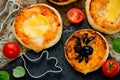 Halloween food background pizza decorated with olive spider and